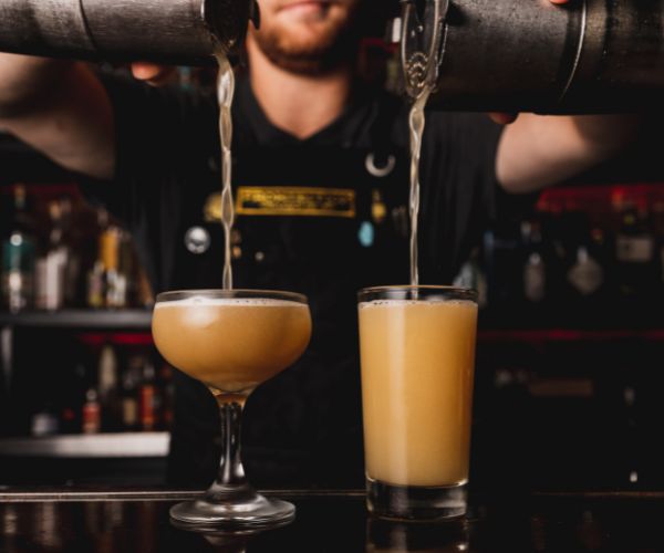 drinks being poured on the bar at prohibition