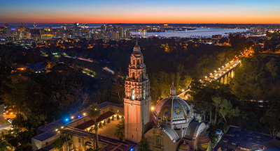 Aerial view of Balboa Park with the California Dome and Tower at dusk